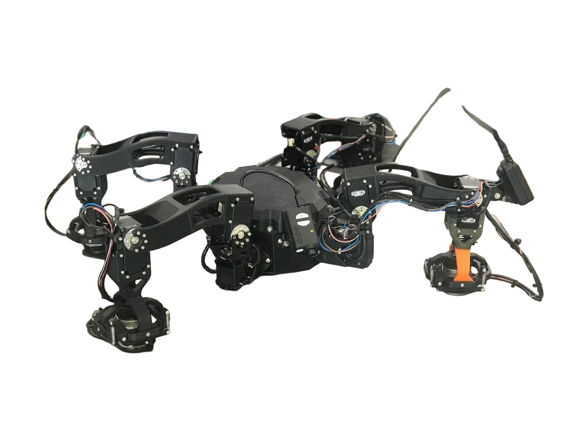 CSIRO Magneto, black four-legged climbing robot with magnetic feet and exposed cabling, seen from the side, CSIRO photo