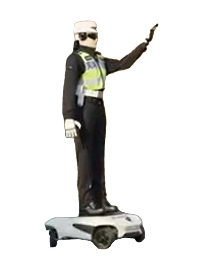 AiMOGA Intelligent Police R001, humanoid in a black traffic police uniform with a yellow high-visibility vest, white cap, sunglasses and white gloves, standing on a white wheeled platform with its right arm raised, seen at an angle from the front, press photo